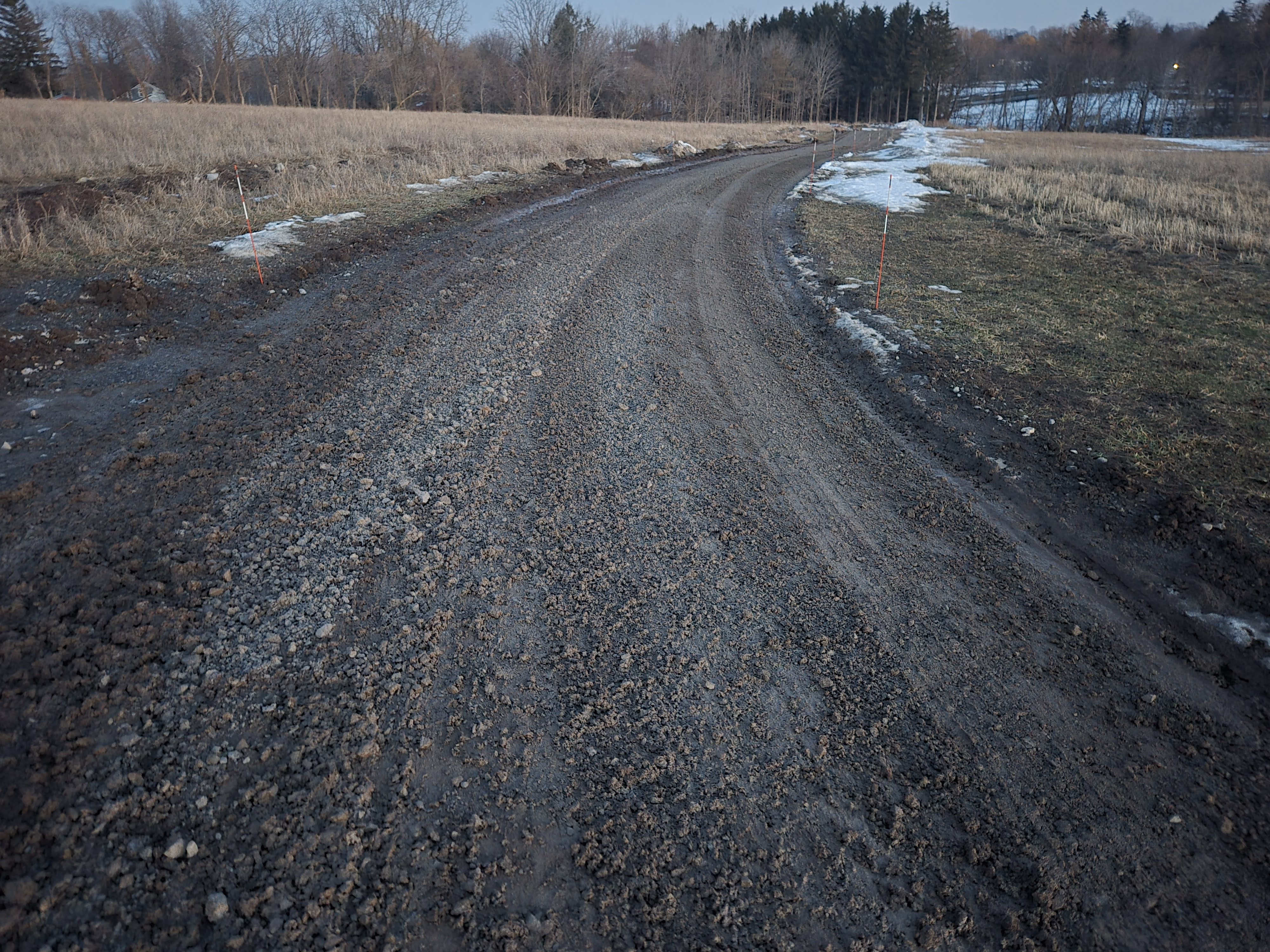 1,600 ft residential driveway after regrading - smooth and freshly graded