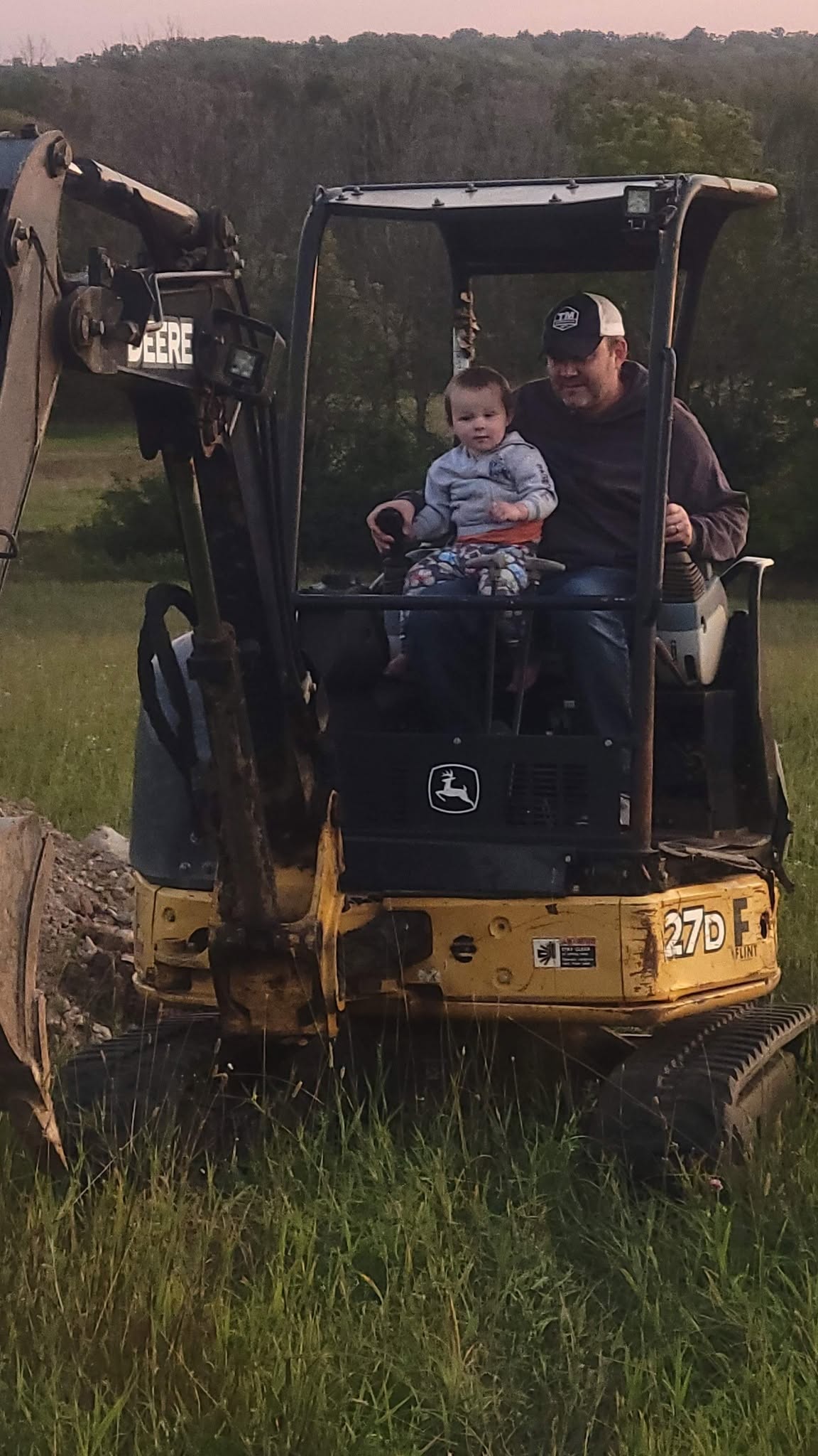 Richard, owner of Driveway Doctors of NY, on the job with his son